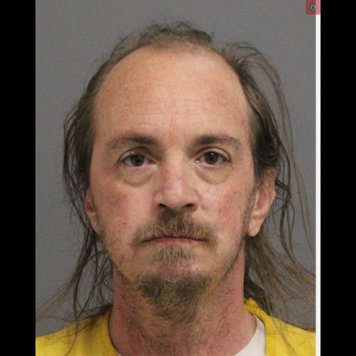 Jail booking photo of adult male