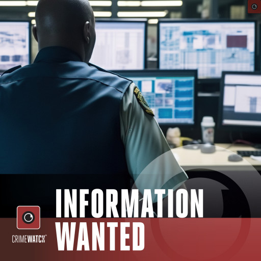 A man monitoring several computer screens and dashboards.